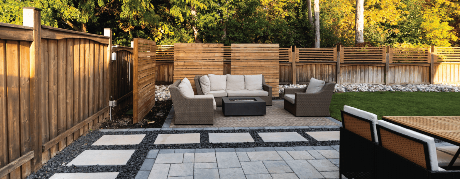 Landscaped yard with fencing | Del Grande Homes